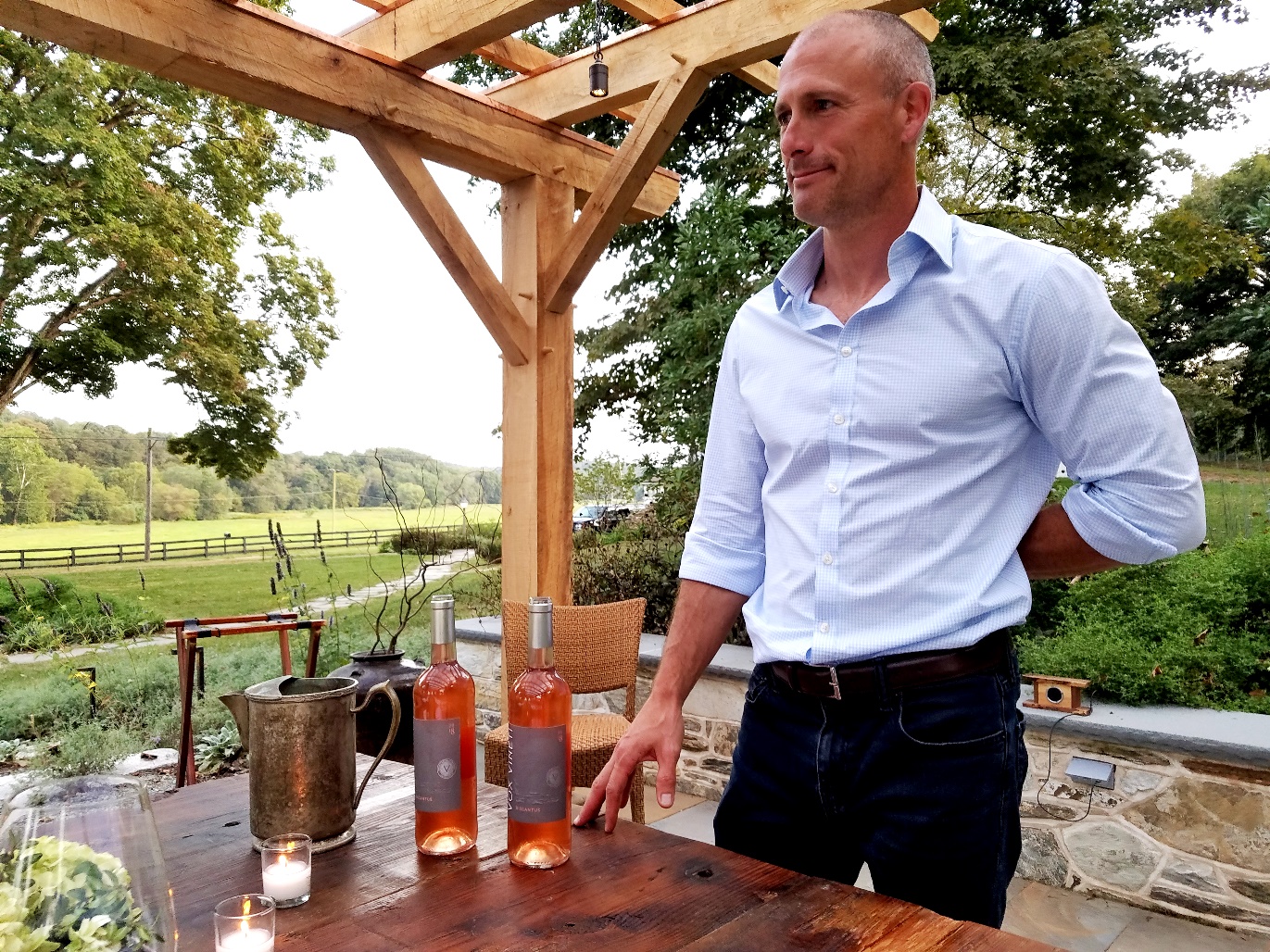 Photo Credit: Wine Casual, Vox Vineti Wines' owner and winegrower, Ed Lazzerini, pours a rosé, Discantus 2018. Wine Casual.