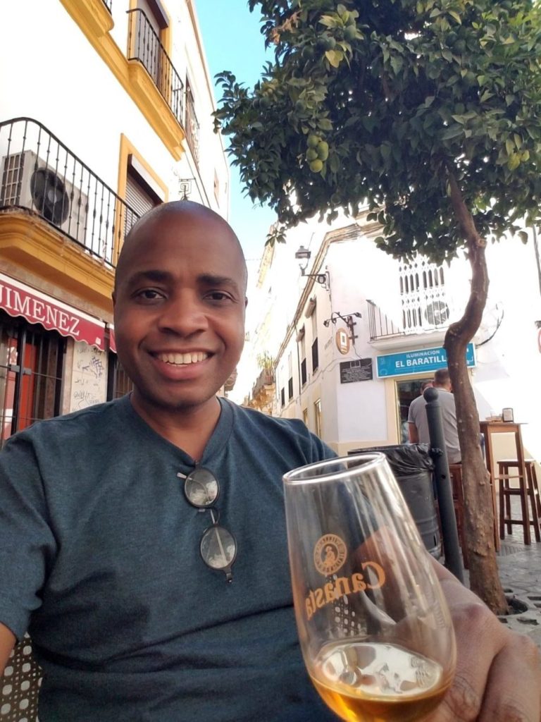 Reggie Solomon enjoys a glass of Palo Cortado Sherry at a Tabanco in Jerez de la Frontera, Spain.